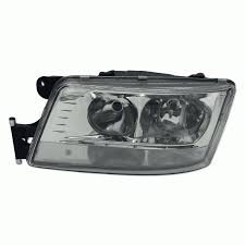 Фара MAN TGX TGS  левый SUNFAR M0282058 LH
