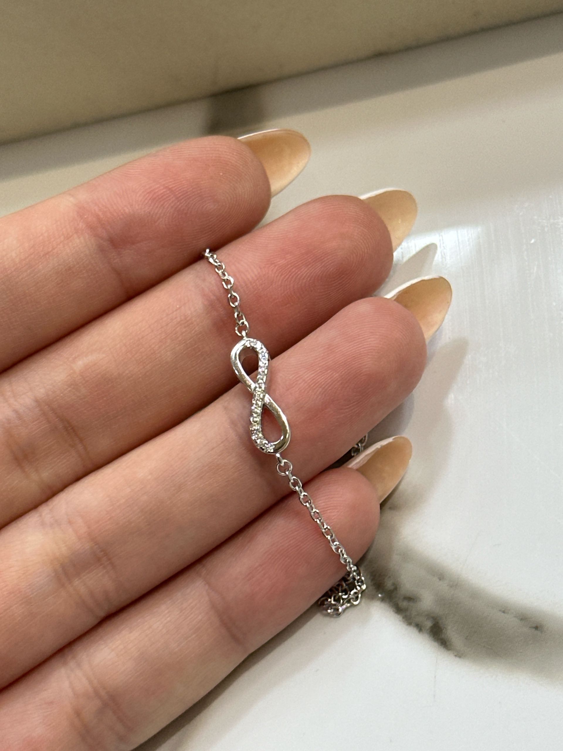 браслет бесконечность